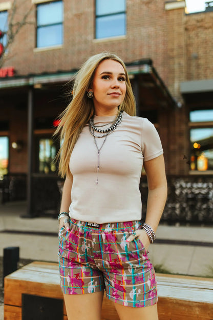 Woman wearing Rock It boxer shorts with high-rise waistband and bold style